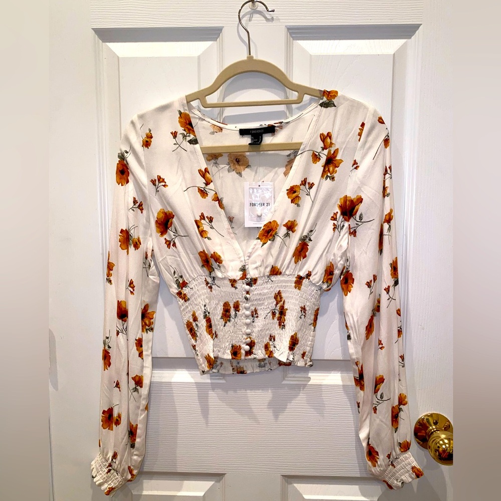 Forever 21 long sleeve top. Size Small, tags on, never worn. Floral print